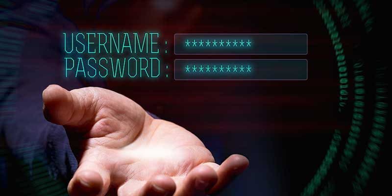hacker stealing username and password for credential stuffing attack